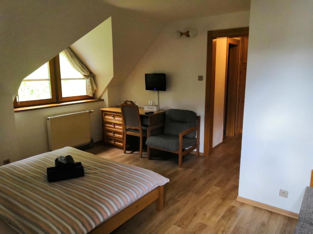 Postel nebo postele na pokoji v ubytování Hotel Gabriela
