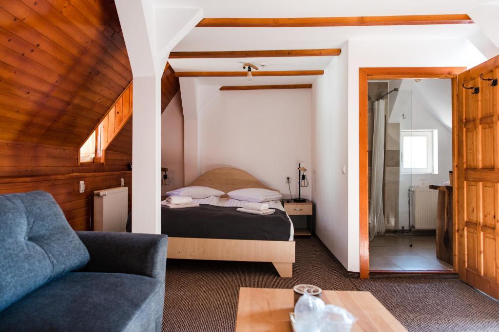 Säng eller sängar i ett rum på Gasthaus Hundorf