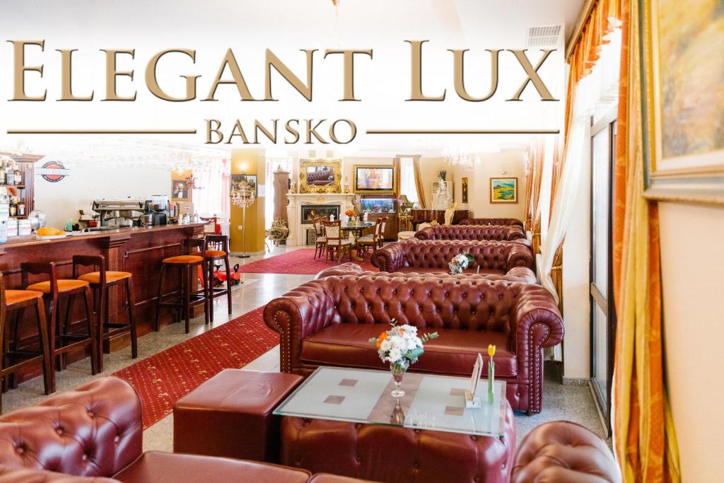 A restaurant or other place to eat at Elegant Lux Hotel