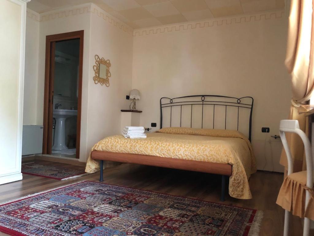 Postel nebo postele na pokoji v ubytování B&B Ernestina