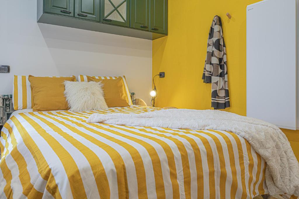 Postel nebo postele na pokoji v ubytování Casa SOLE- Loft moderno in montagna
