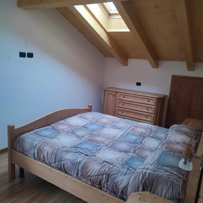 Postel nebo postele na pokoji v ubytování Appartamenti Meoti