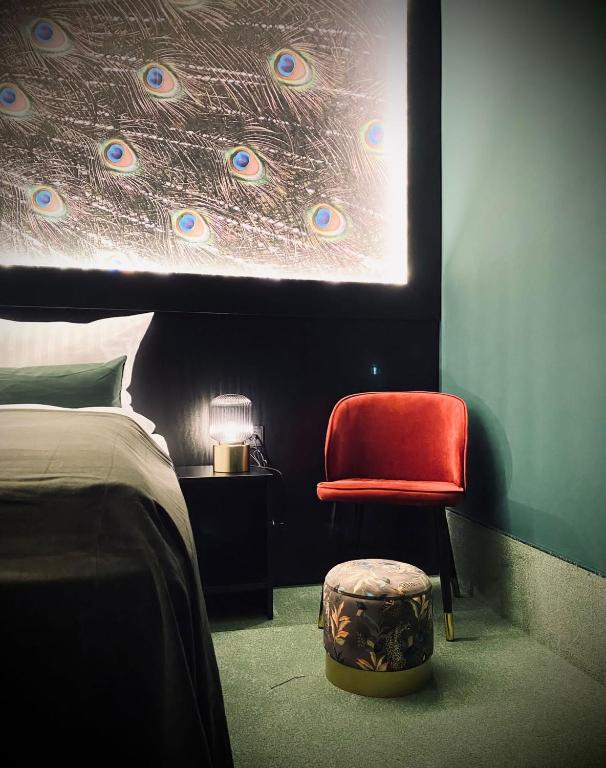 Postel nebo postele na pokoji v ubytování Sleephotels Casino