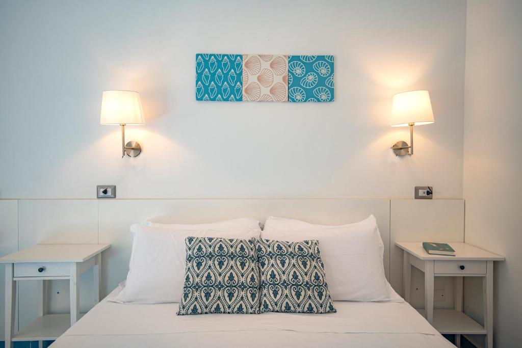 Postel nebo postele na pokoji v ubytování Sonnino B&B