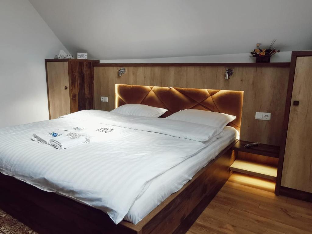 Postel nebo postele na pokoji v ubytování Vila Platon