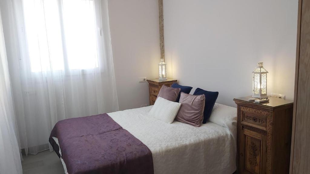 Postel nebo postele na pokoji v ubytování Del Parque Flats Soho Barroso