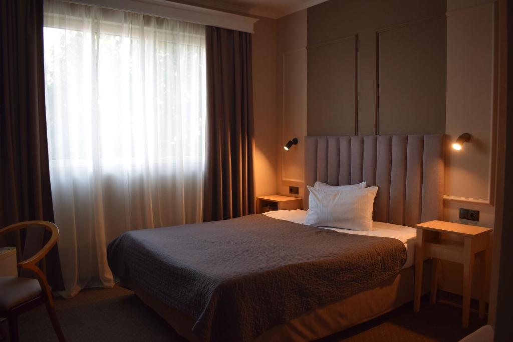 Postel nebo postele na pokoji v ubytování Vila Camino