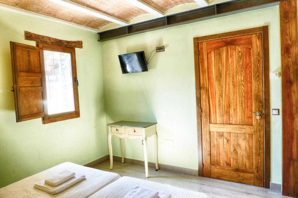 TV a/nebo společenská místnost v ubytování Casa rural El Roble Hueco