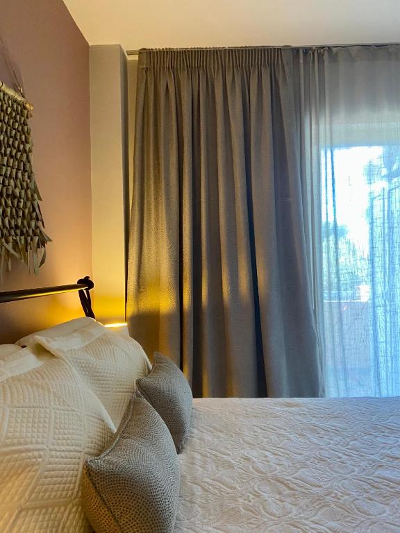 Posteľ alebo postele v izbe v ubytovaní Cozy flat elix