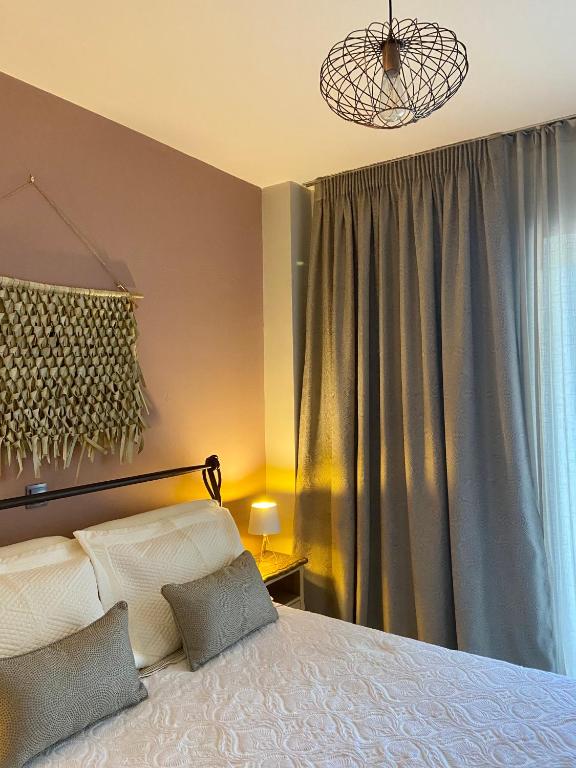 Posteľ alebo postele v izbe v ubytovaní Cozy flat elix