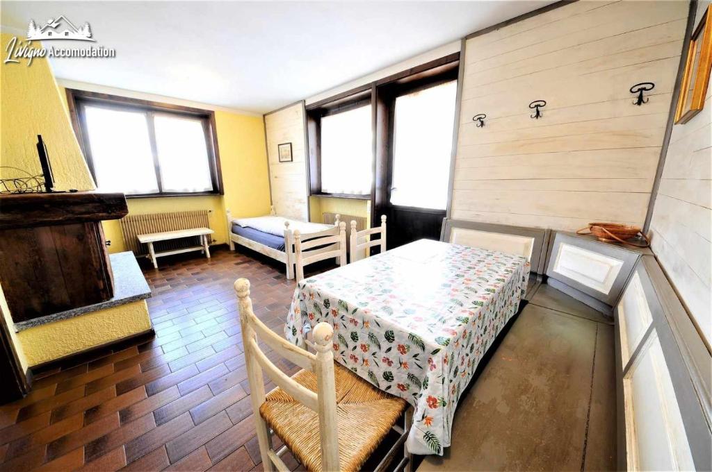 Posteľ alebo postele v izbe v ubytovaní Baite Costaccia App 4 by Livigno Accomodation
