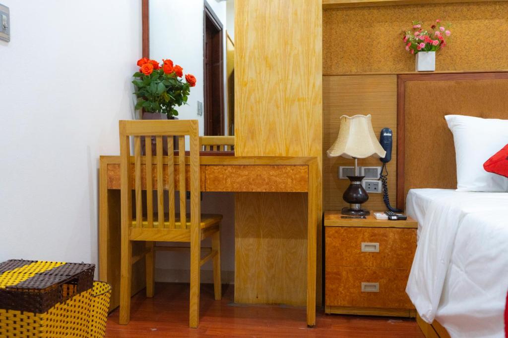 Postel nebo postele na pokoji v ubytování Moon Hotel Cau Giay