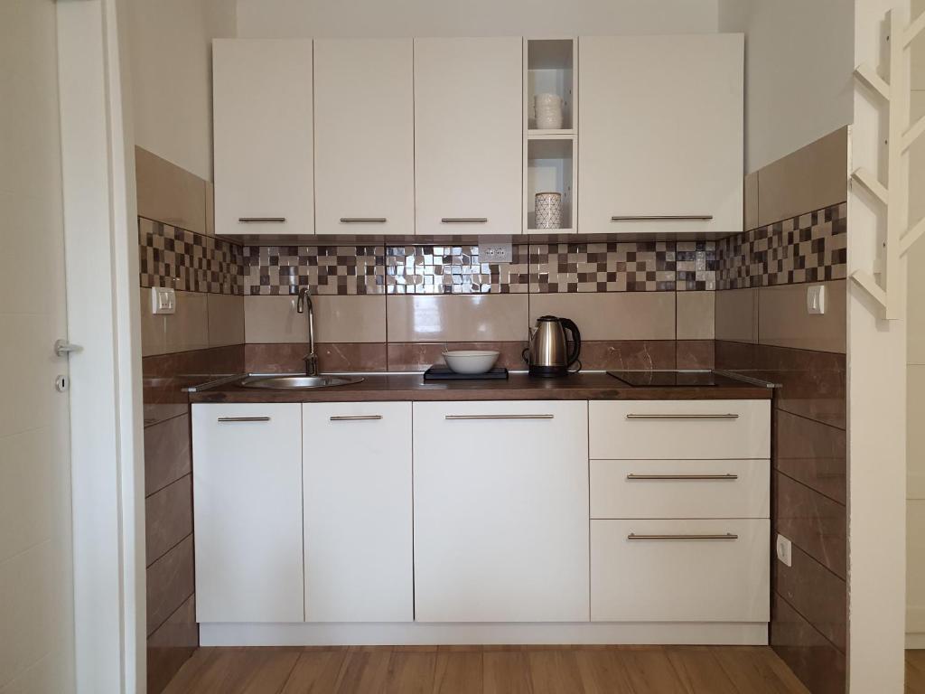 Kuchyň nebo kuchyňský kout v ubytování Apartman NEDA Zlatar