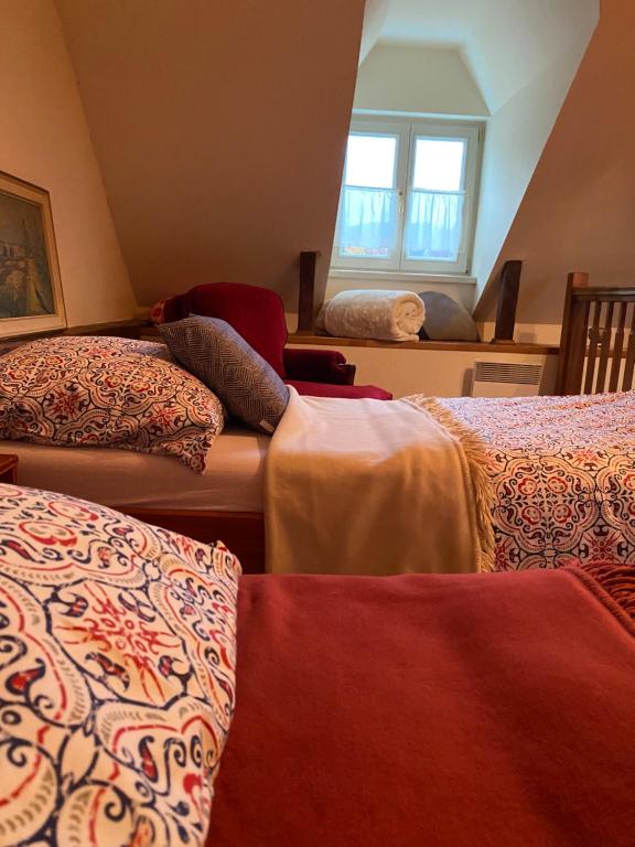 A bed or beds in a room at Vila Nízke Tatry