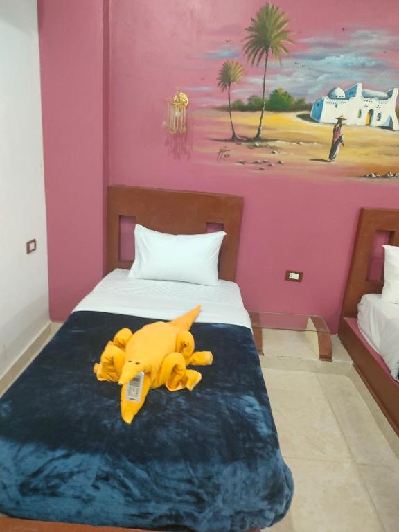 Postel nebo postele na pokoji v ubytování Nukud guest house