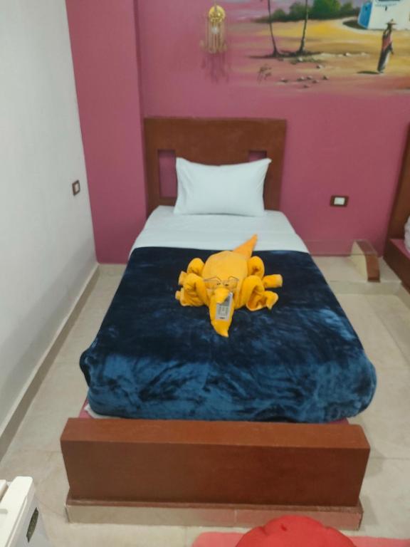 Postel nebo postele na pokoji v ubytování Nukud guest house