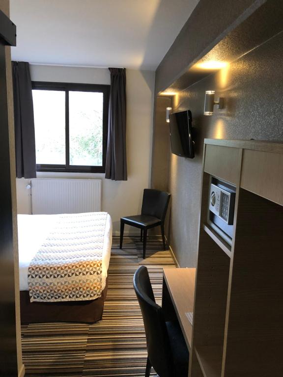 Kuchyň nebo kuchyňský kout v ubytování Hotel Bollaert