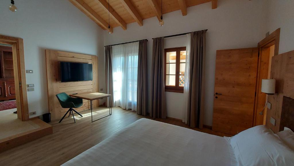 Letto o letti in una camera di Corte Varola B&B Zia Marisa