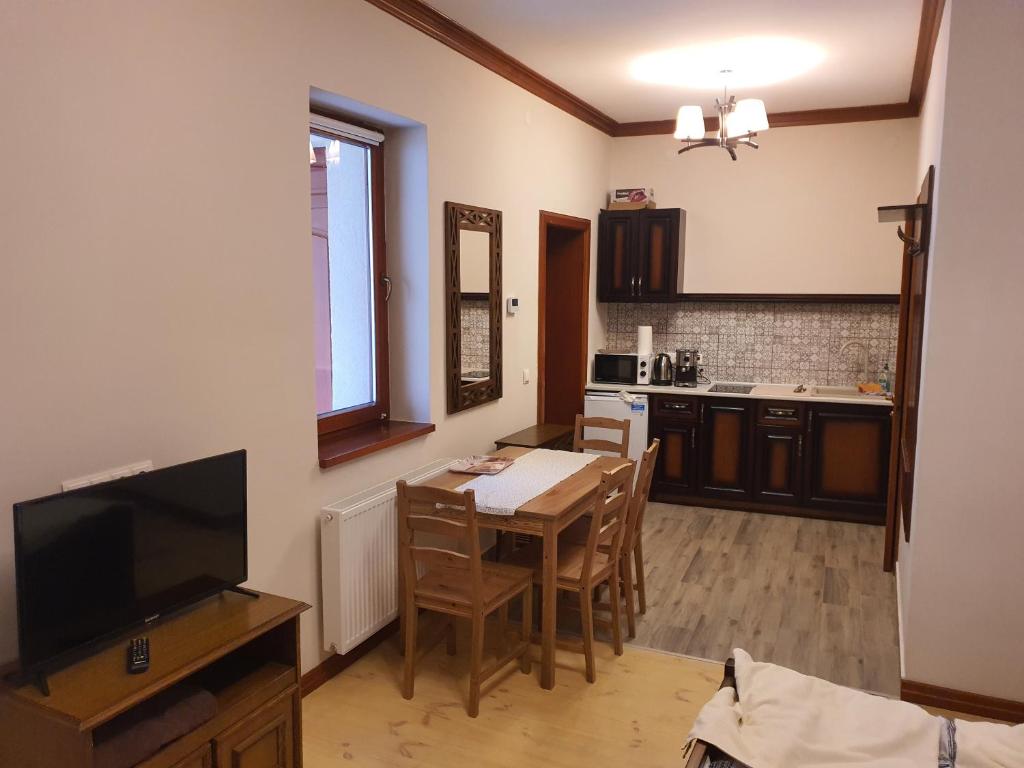 Kuchyň nebo kuchyňský kout v ubytování Bereg-Travel