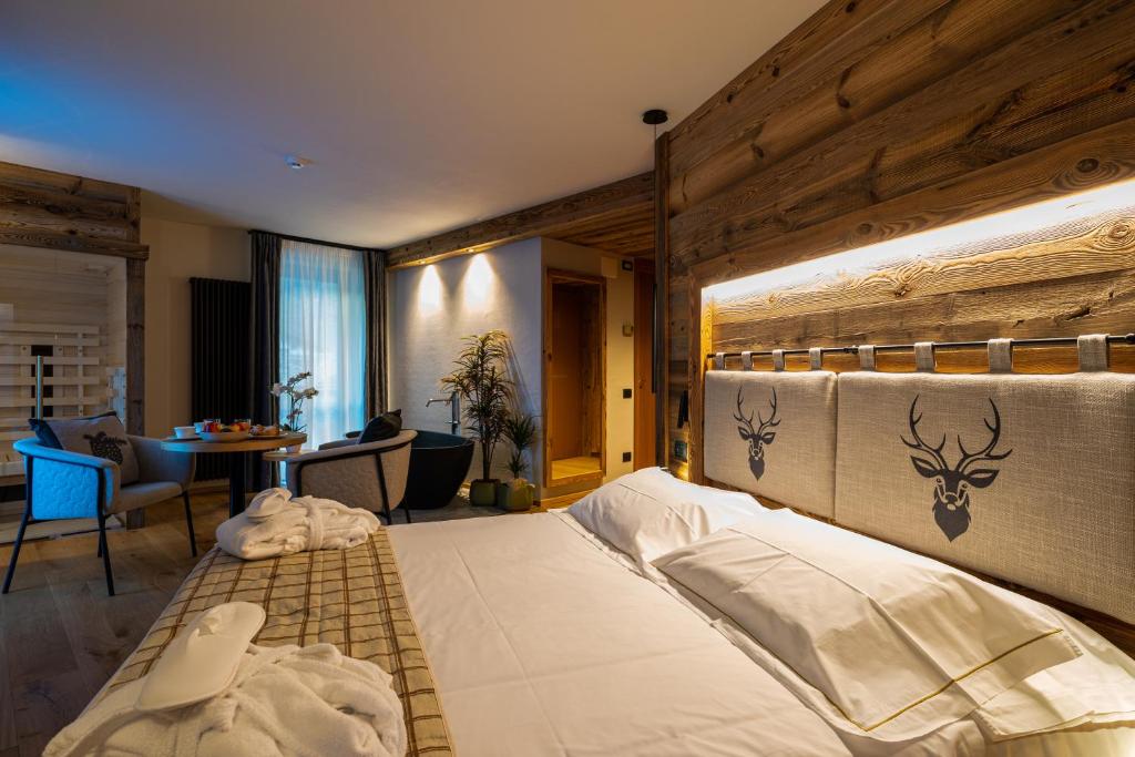 Postel nebo postele na pokoji v ubytování Lo Scoiattolo Hotel