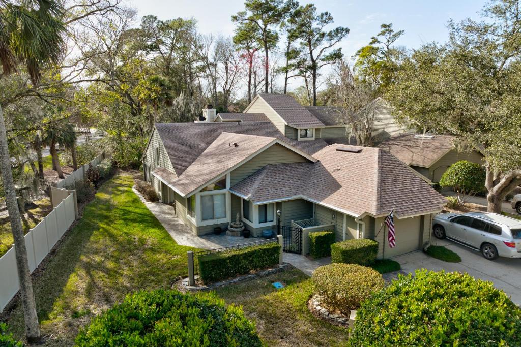 an aerial view of a house with a driveway at Loggerhead - Lodge in Ponte Vedra Beach