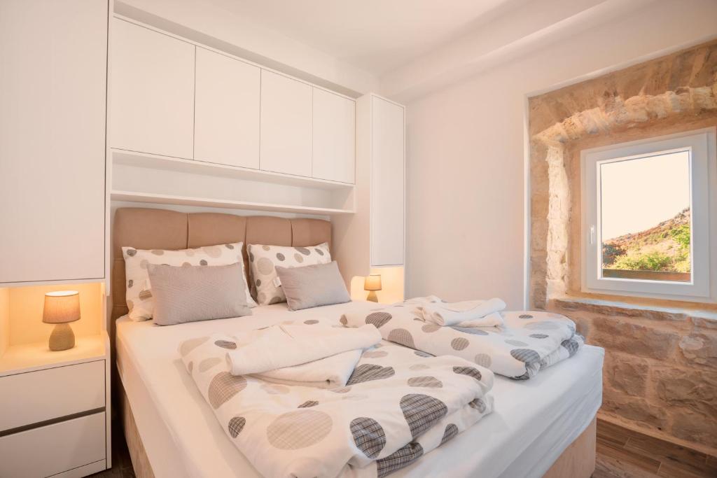 Posteľ alebo postele v izbe v ubytovaní Old Stone House GP