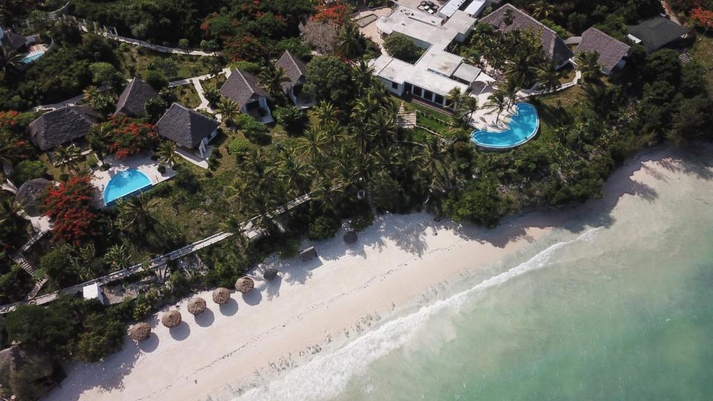 an aerial view of a resort and the beach at Shooting Star Boutique Hotel in Kiwengwa