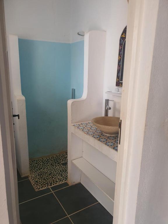 Postel nebo postele na pokoji v ubytování Dar Chick Yahia Ile De Djerba