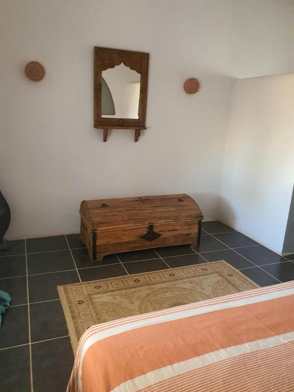 Postel nebo postele na pokoji v ubytování Dar Chick Yahia Ile De Djerba