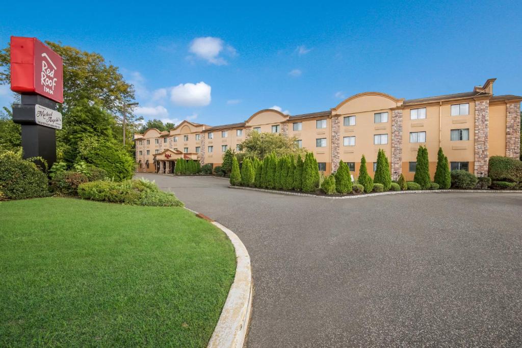 a road in front of a building at Red Roof Inn Fairfield in Fairfield