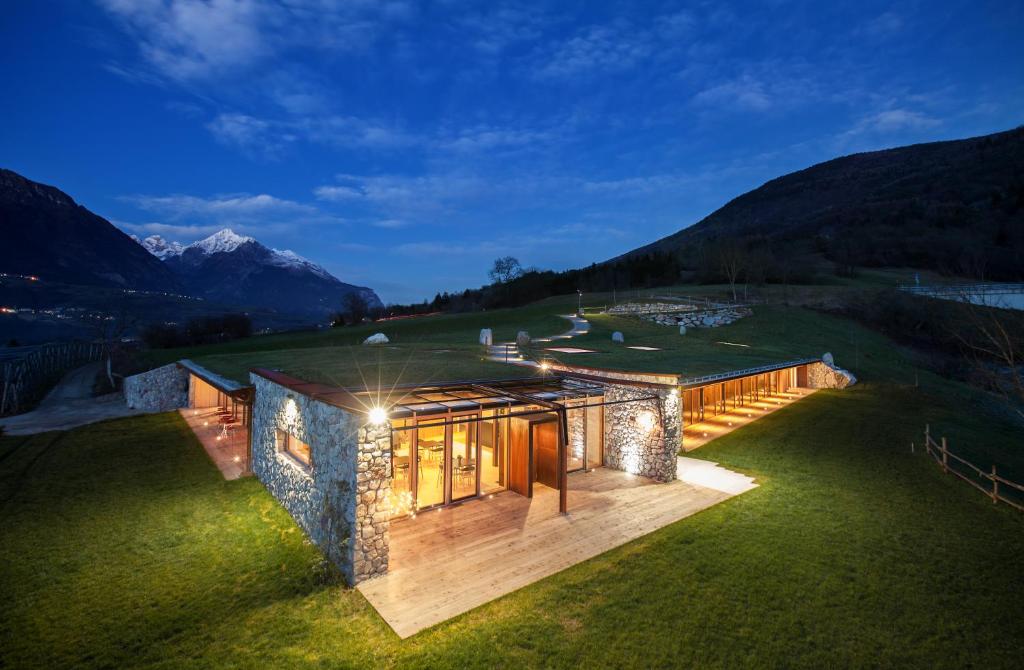 a house on top of a hill with a view at Casariga in Comano Terme