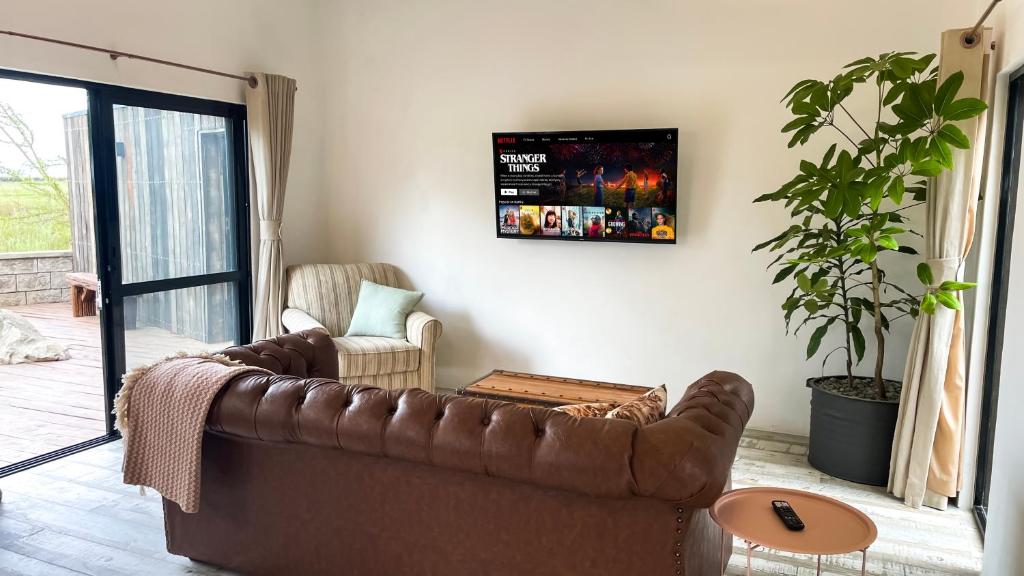 TV a/nebo společenská místnost v ubytování The Croft
