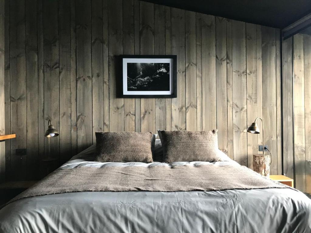 Postel nebo postele na pokoji v ubytování Hotel & Cava Estancia Rilán