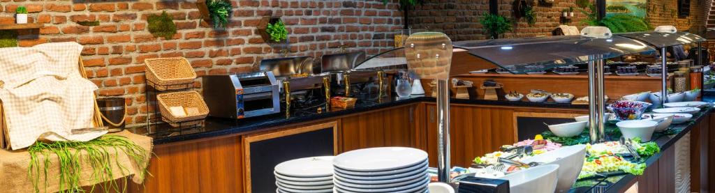 A restaurant or other place to eat at Aprilis Hotel - Special Category