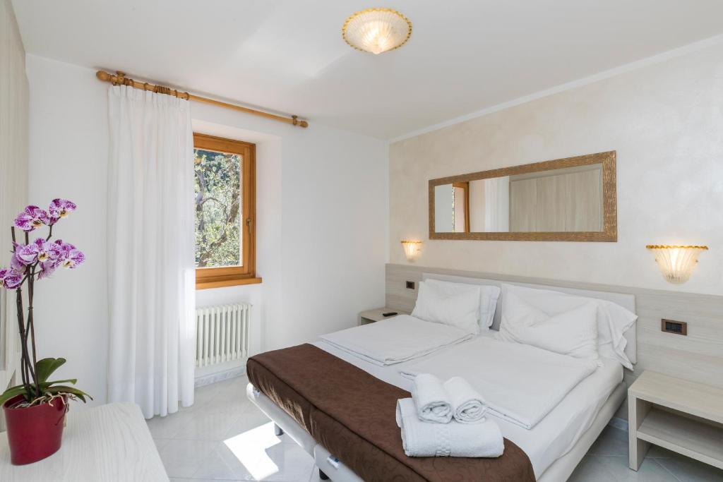 Postel nebo postele na pokoji v ubytování B&B Casa Benamati by Kelly