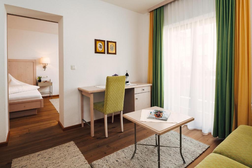 Postel nebo postele na pokoji v ubytování Hotel Regina