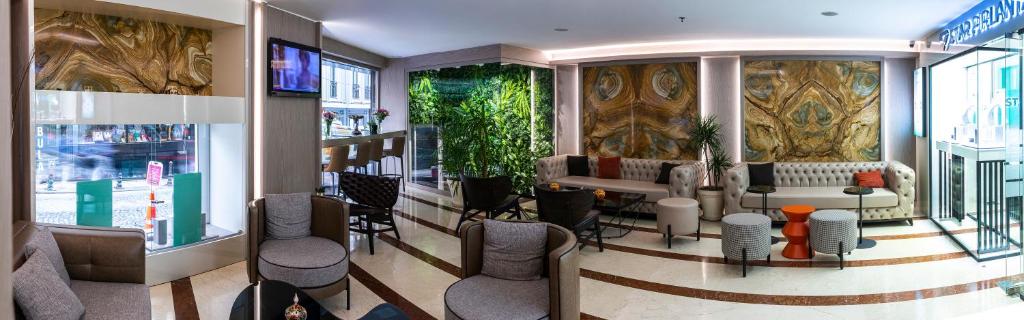 A seating area at Aprilis Hotel - Special Category