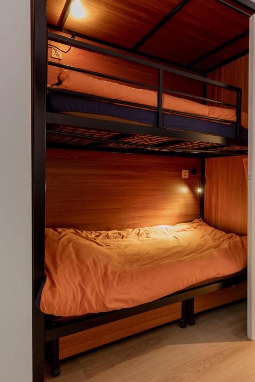 Postel nebo postele na pokoji v ubytování Recharge Hostel