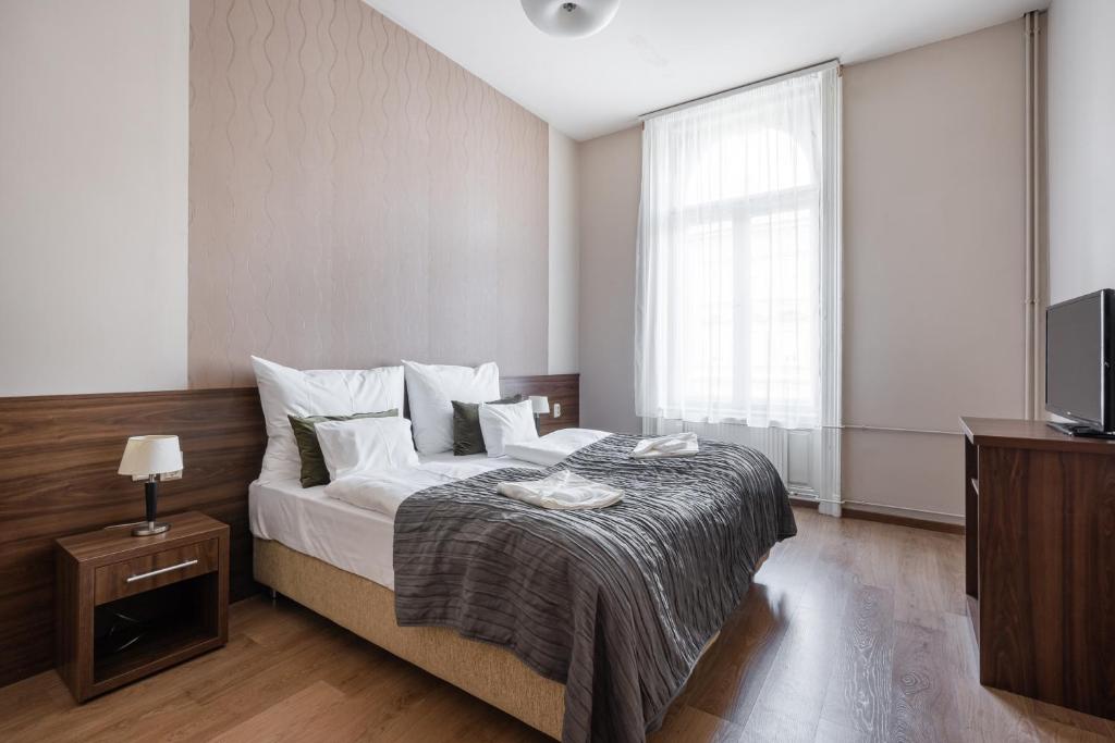 Posteľ alebo postele v izbe v ubytovaní Elit Boutique Rooms- Best Location by BQA