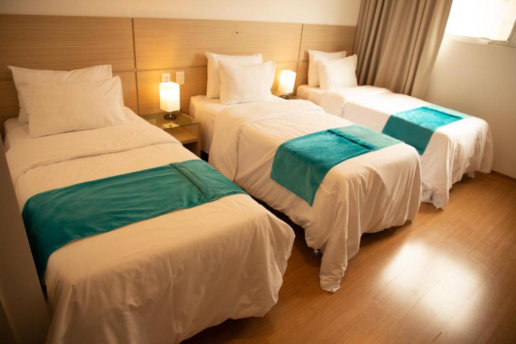 Postel nebo postele na pokoji v ubytování Hotel Franco