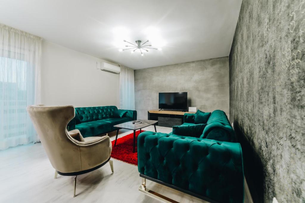 TV a/nebo společenská místnost v ubytování Garni Hotel Radović