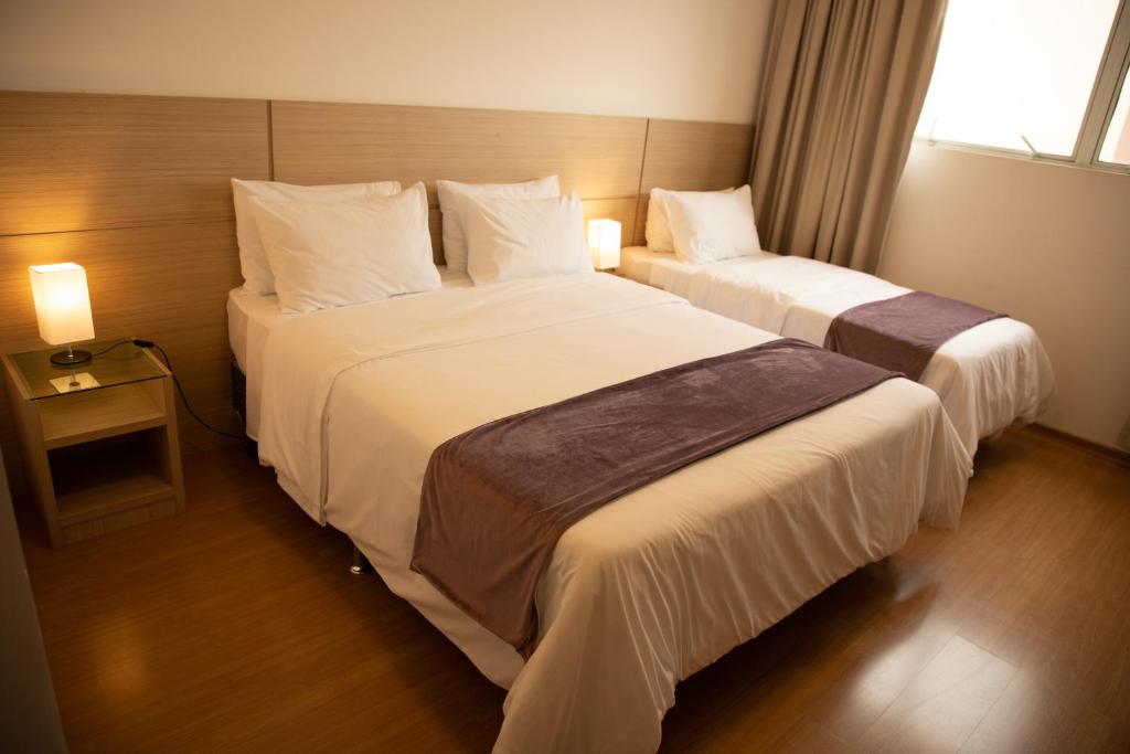 Postel nebo postele na pokoji v ubytování Hotel Franco