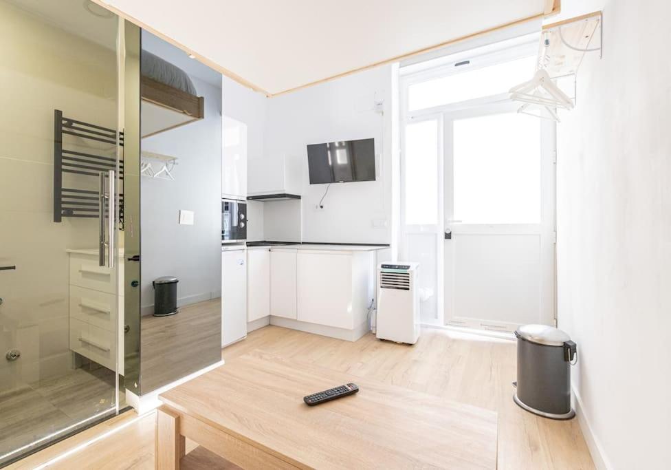 Kuchyň nebo kuchyňský kout v ubytování Coqueto apartamento cerca Bravo Murillo WIFI