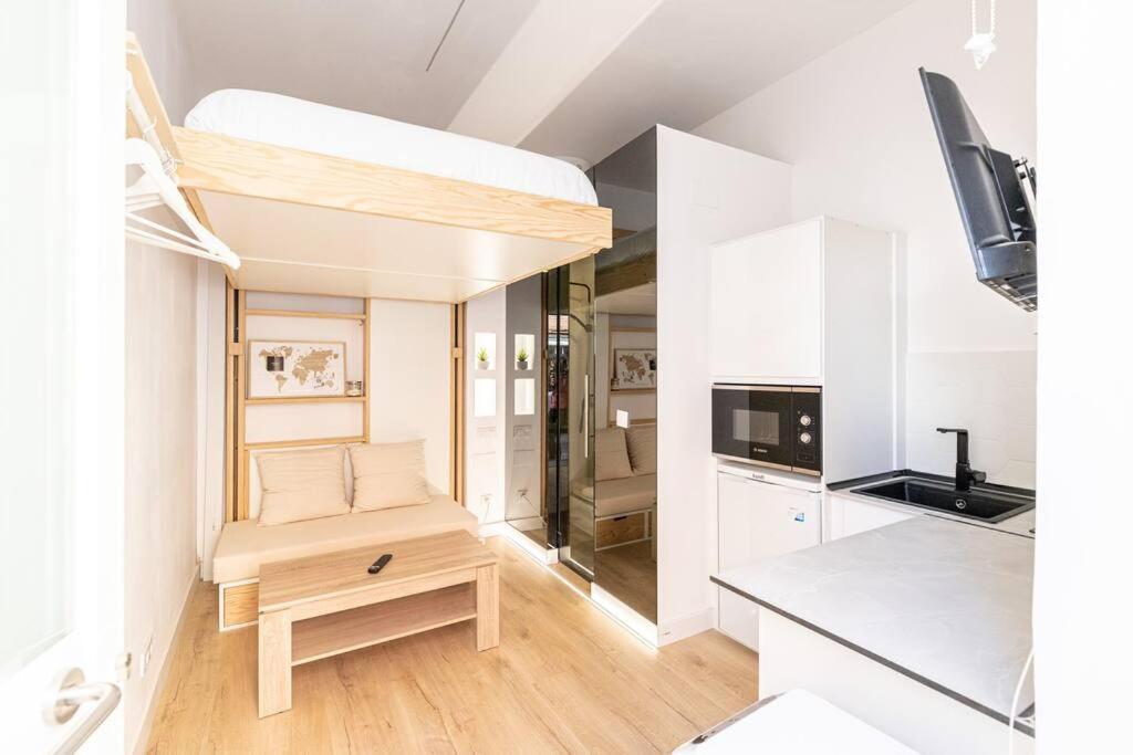 Kuchyň nebo kuchyňský kout v ubytování Coqueto apartamento cerca Bravo Murillo WIFI