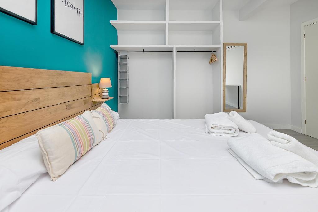 Posteľ alebo postele v izbe v ubytovaní Apartamento San Pedro en casco histórico