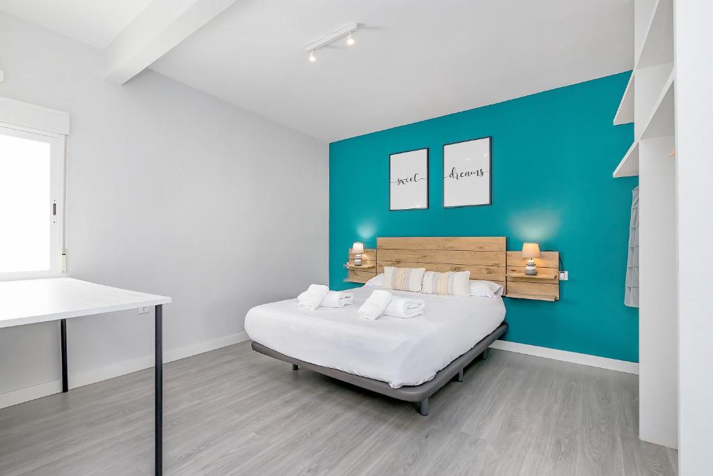 Posteľ alebo postele v izbe v ubytovaní Apartamento San Pedro en casco histórico