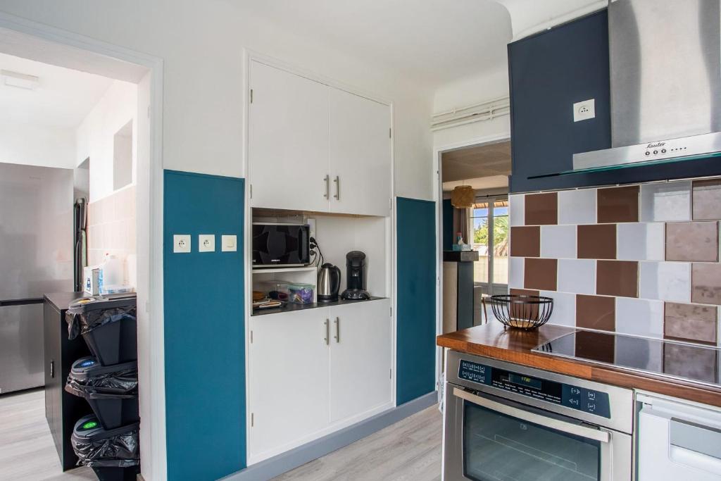 Kuchyňa alebo kuchynka v ubytovaní Appartement Pablo - Welkeys