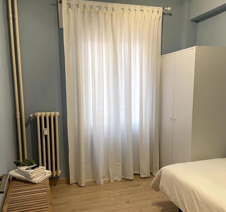 A bed or beds in a room at Piso reformado en el centro de Logroño