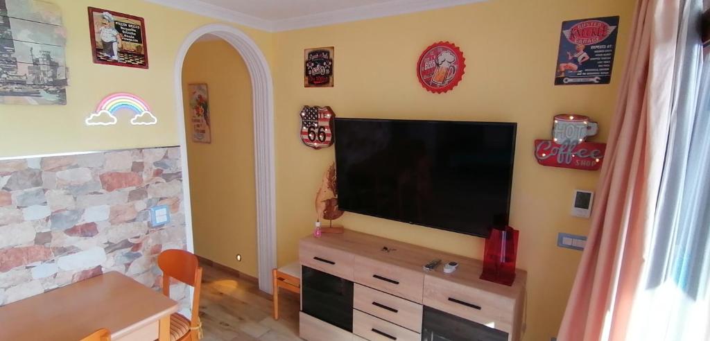 Televízia a/alebo spoločenská miestnosť v ubytovaní Apartamento Glamour near Yumbo Center