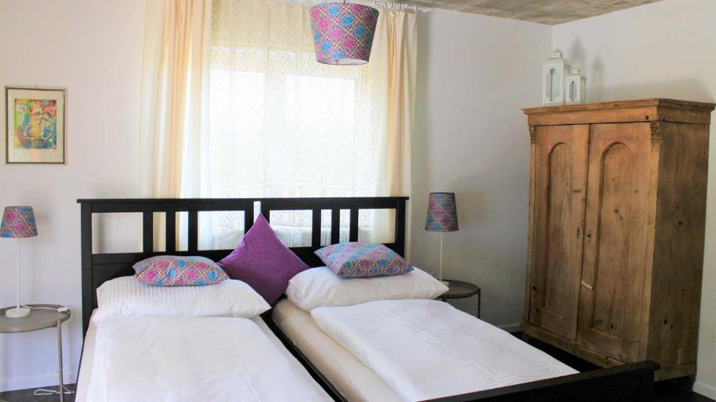 A bed or beds in a room at Urlaub am Kinispa